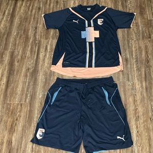 Puma pink dolphin soccer jersey and matching shorts